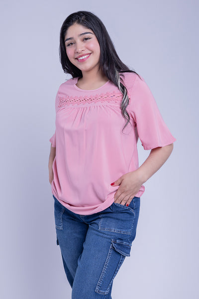 Blusa rosa oversize con detalle tejido