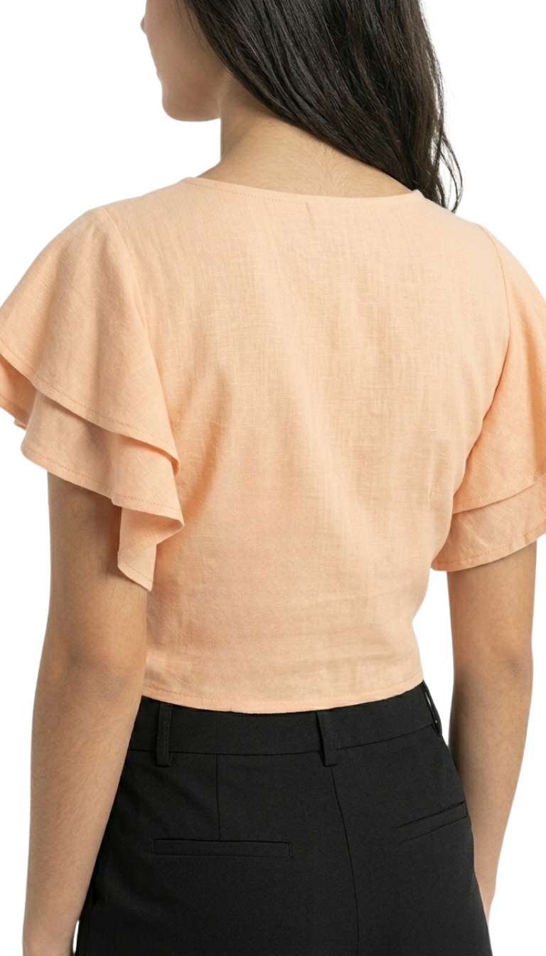 Blusa color salmon con olanes en mangas