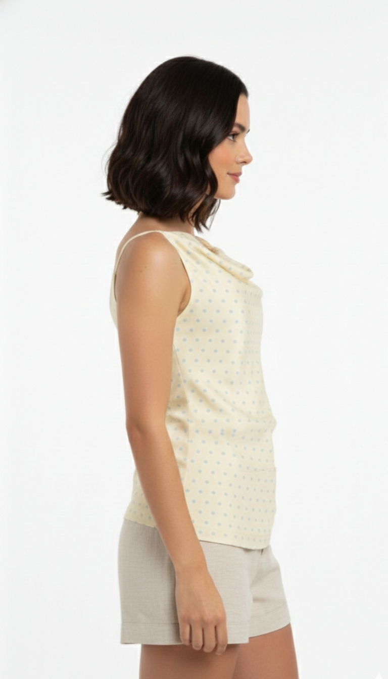 Blusa amarilla con detalle de bolitas azules