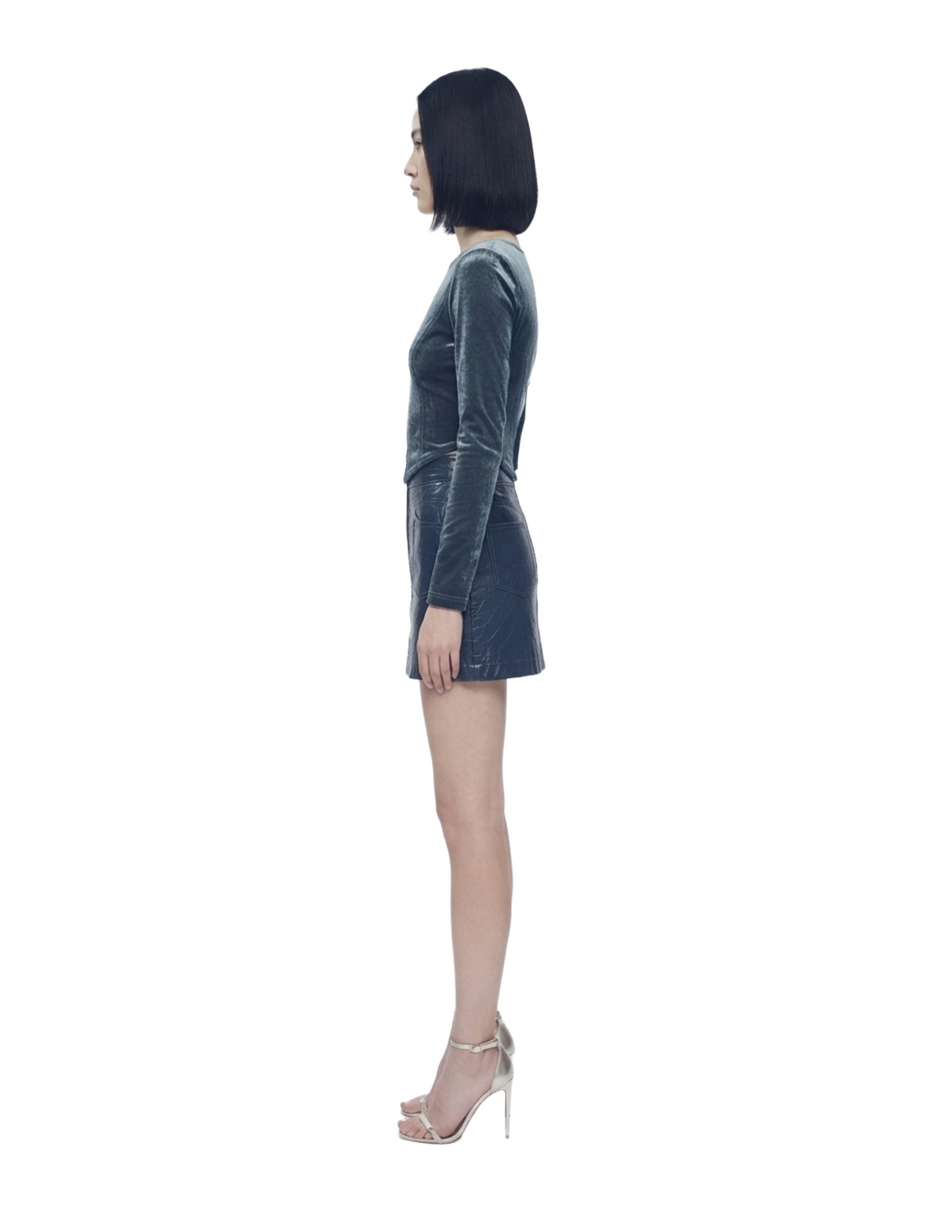 Blusa azul seccionada de gamuza