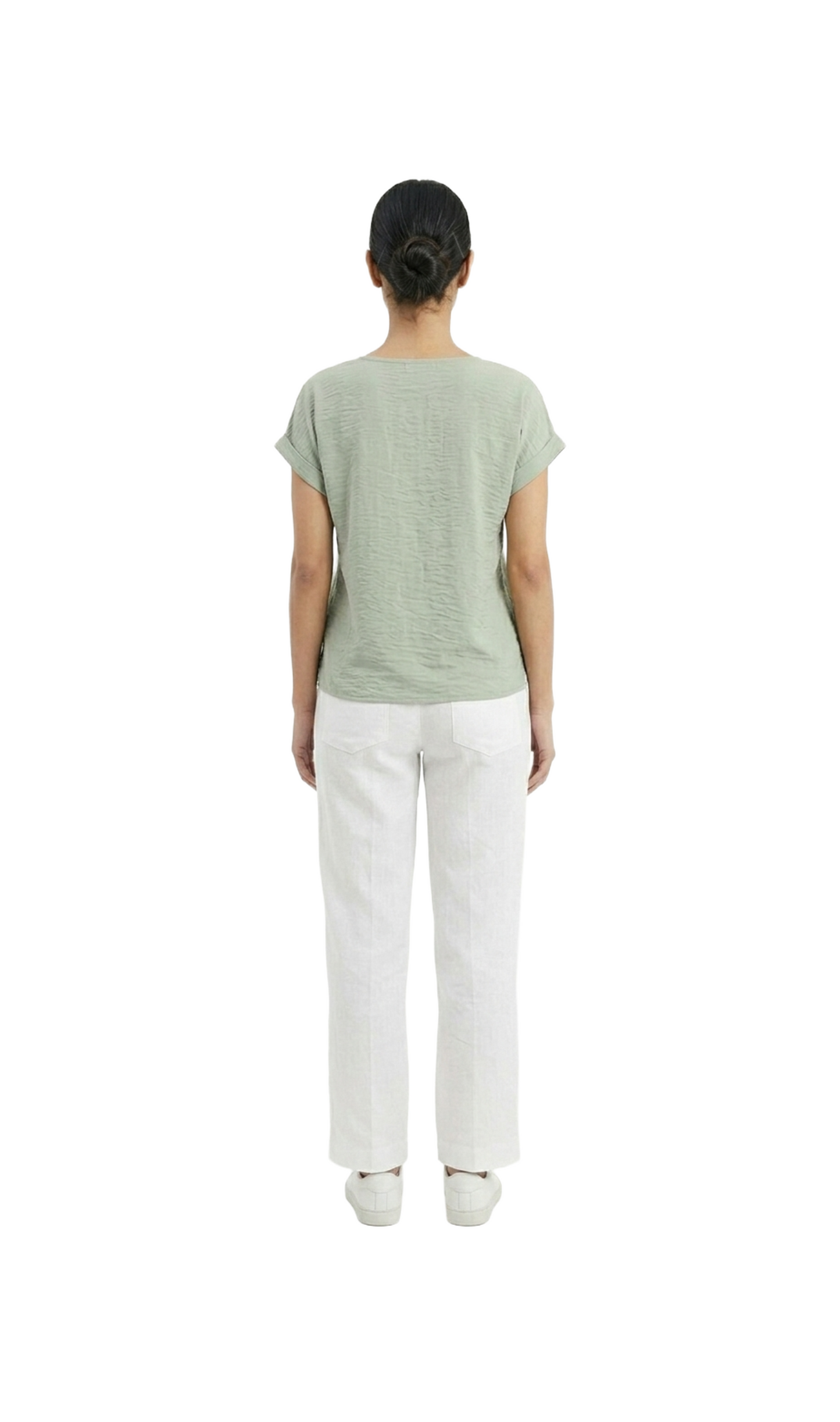 Blusa verde cuello redondo oversize con una bolsita