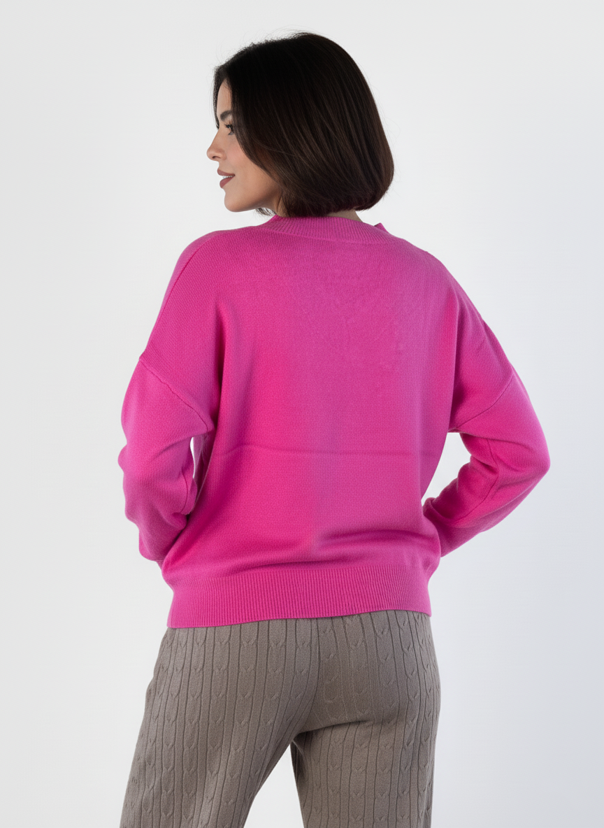 Suéter rosa con brillos