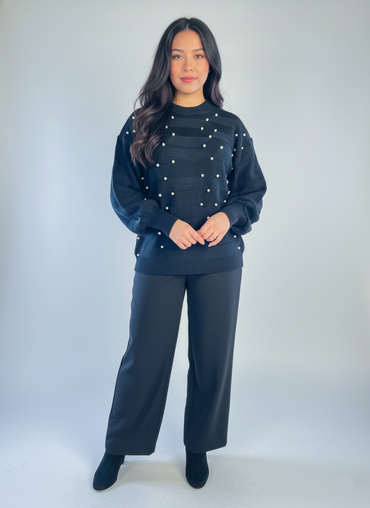 Suéter tejido negro con perlas