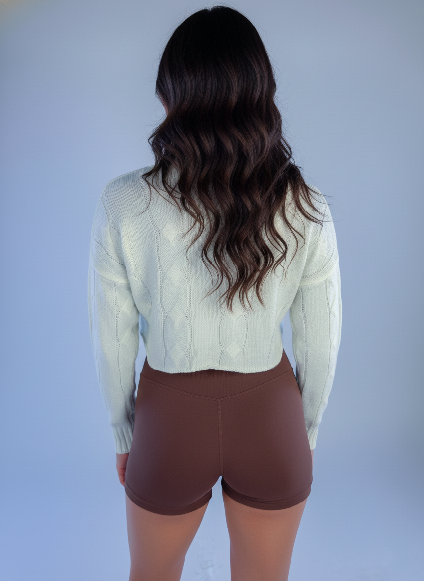 Suéter perla cuello redondo tipo crop top