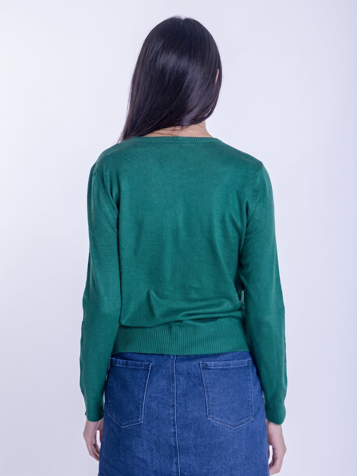Suéter verde con estampado de oso