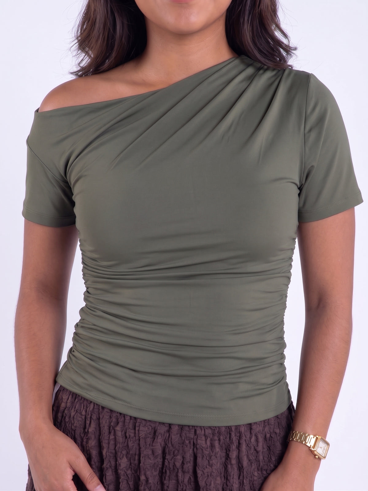 Blusa verde un hombro descubierto