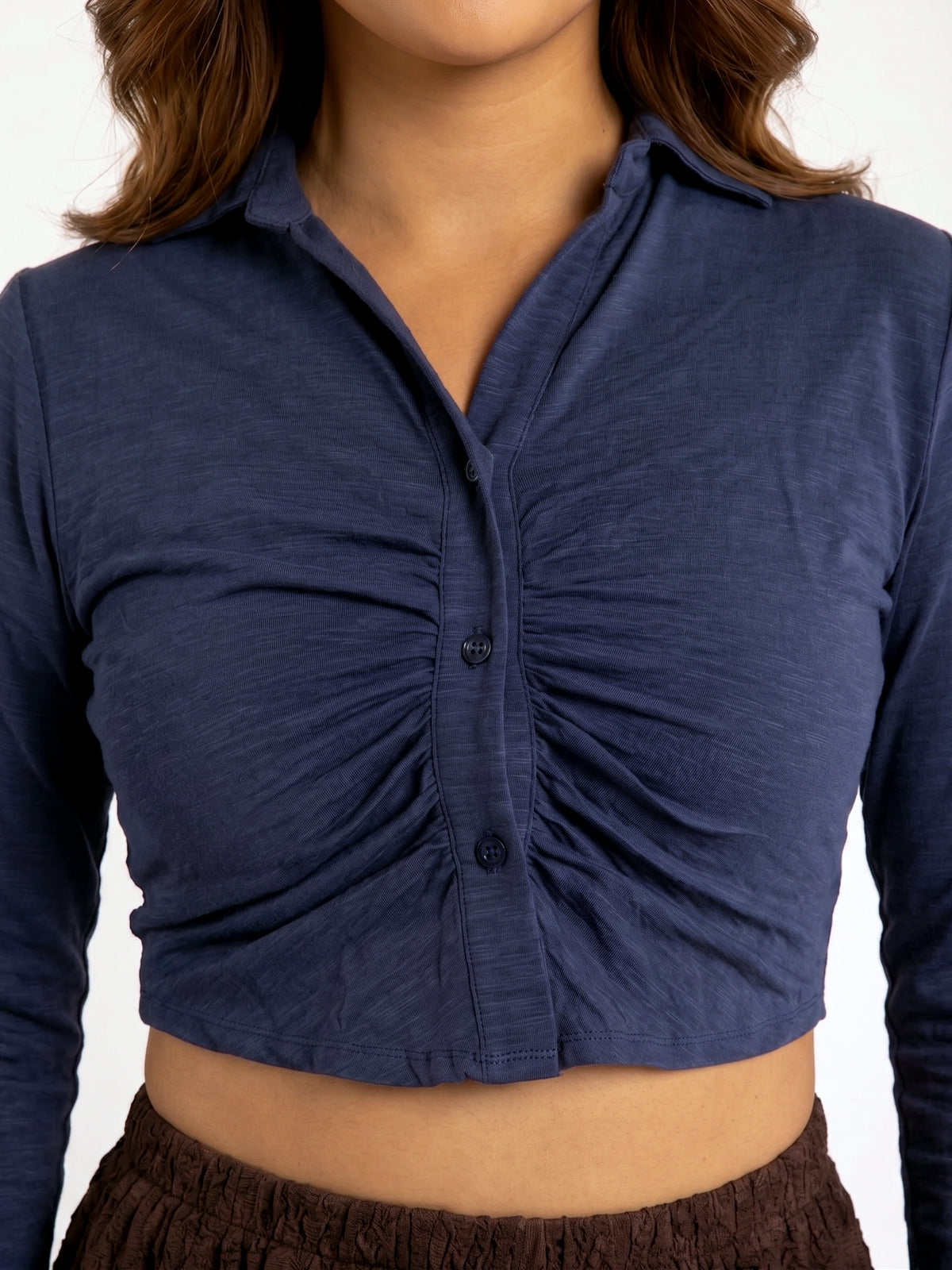 Crop top azul con plisado al centro acanalada
