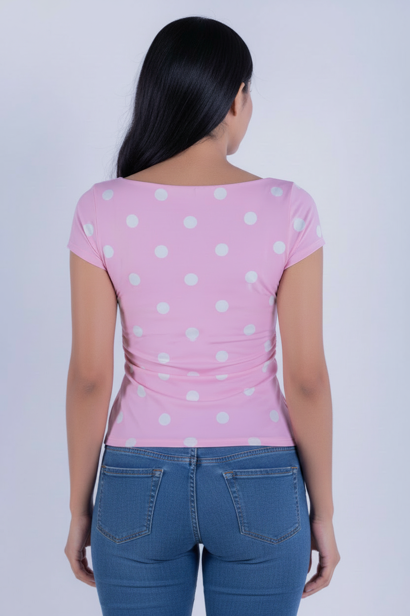 Blusa rosa con estampado de puntos