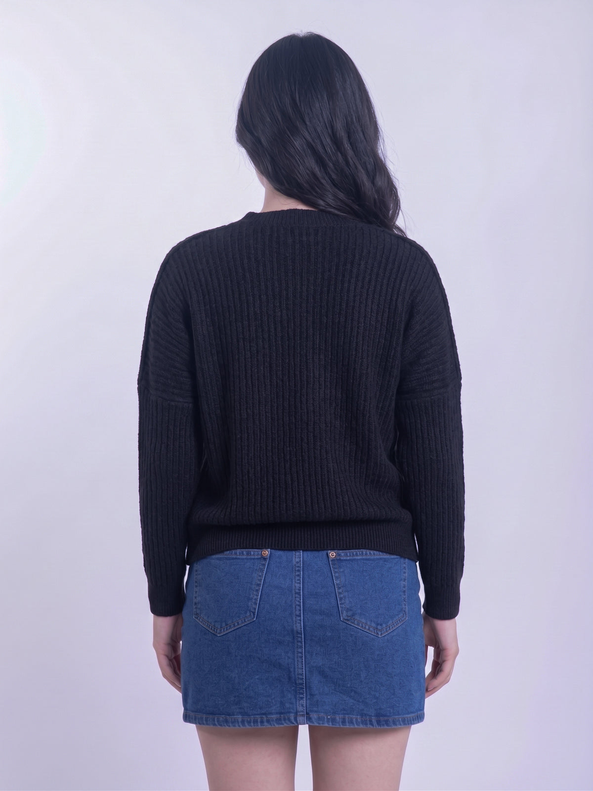 Sueter negro estilo cardigan con bolsitas laterales