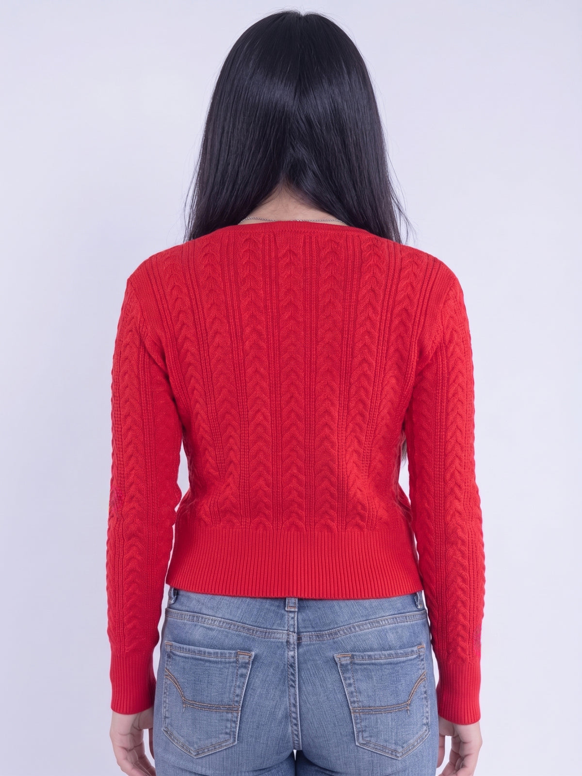 Suéter rojo cuello en V con trenzado en tejido