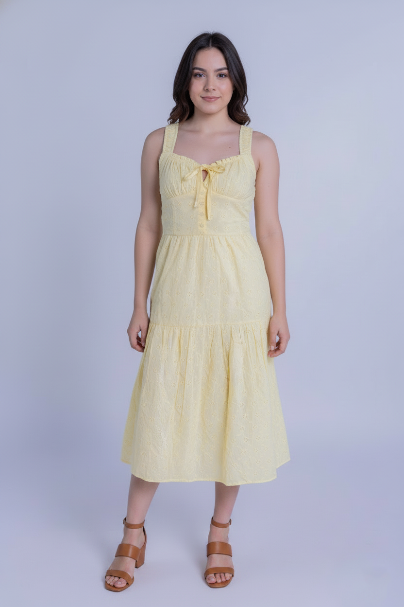 Vestido amarillo con amarre en pecho, seccionado