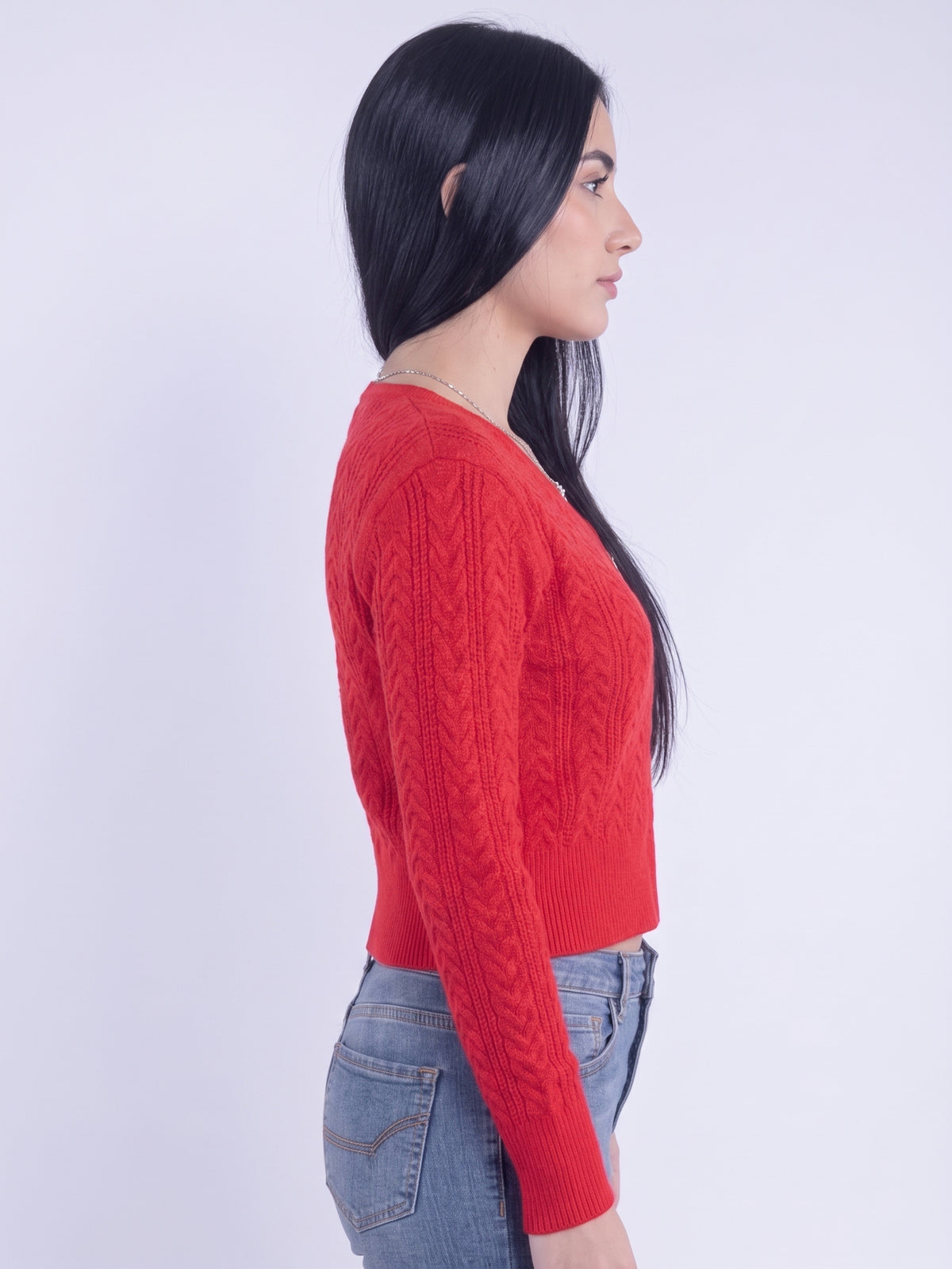 Suéter rojo cuello en V con trenzado en tejido