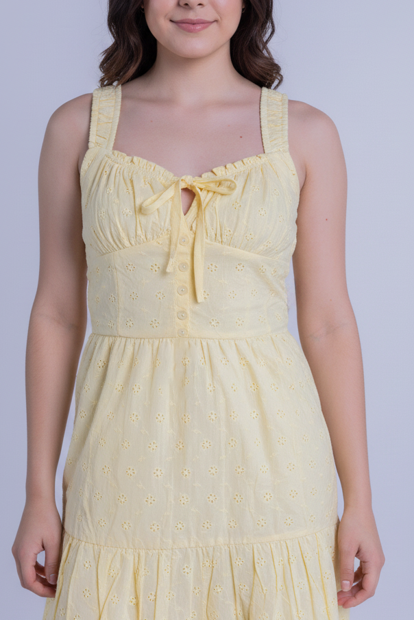 Vestido amarillo con amarre en pecho, seccionado