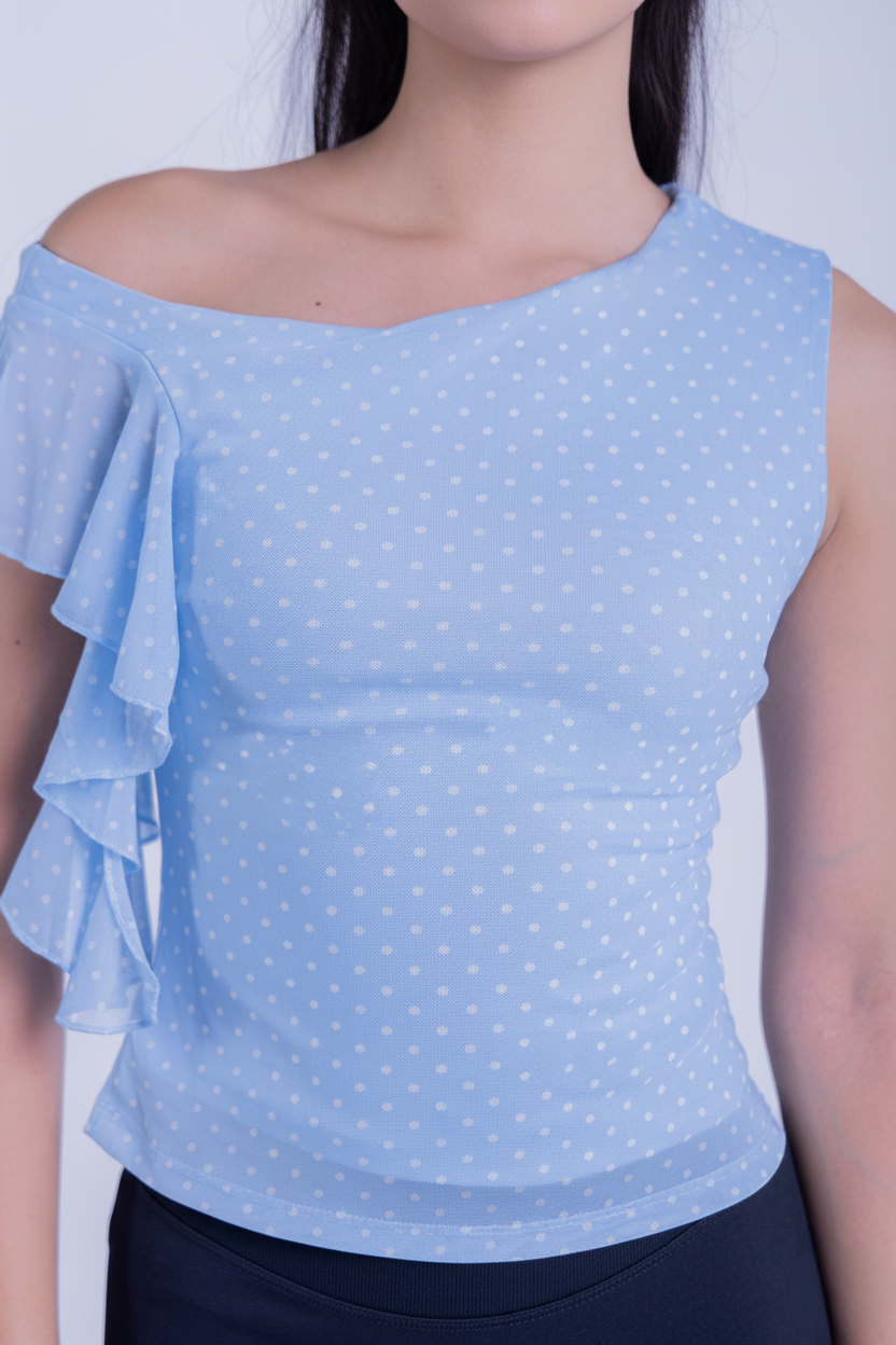 Blusa azul con olanes laterales estampado de puntos