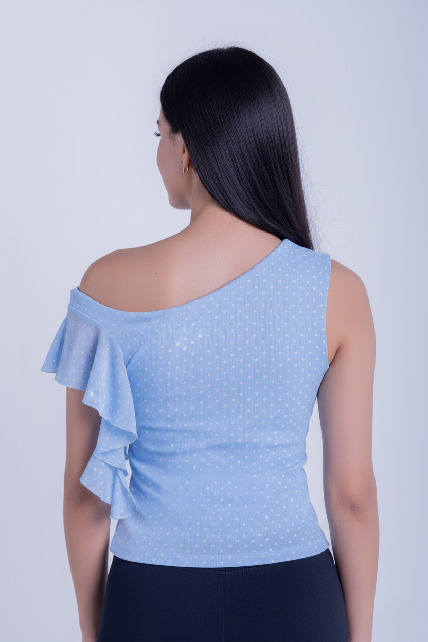 Blusa azul con olanes laterales estampado de puntos