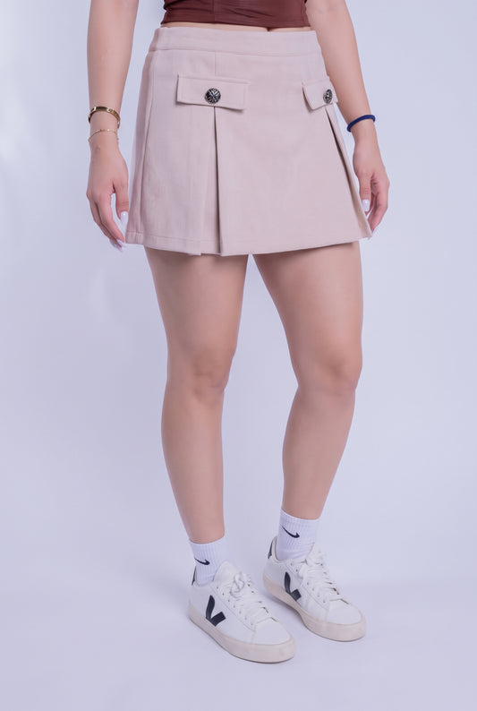 Falda beige con bolsas tipo cartera al frente