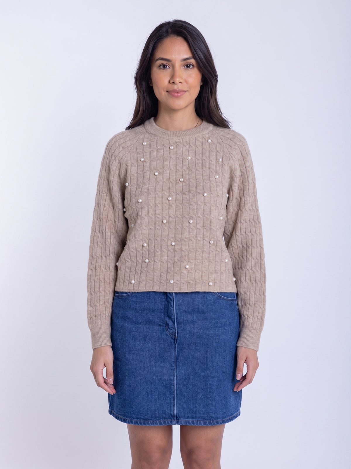Suéter beige acanalado tejido con brillos decorativos