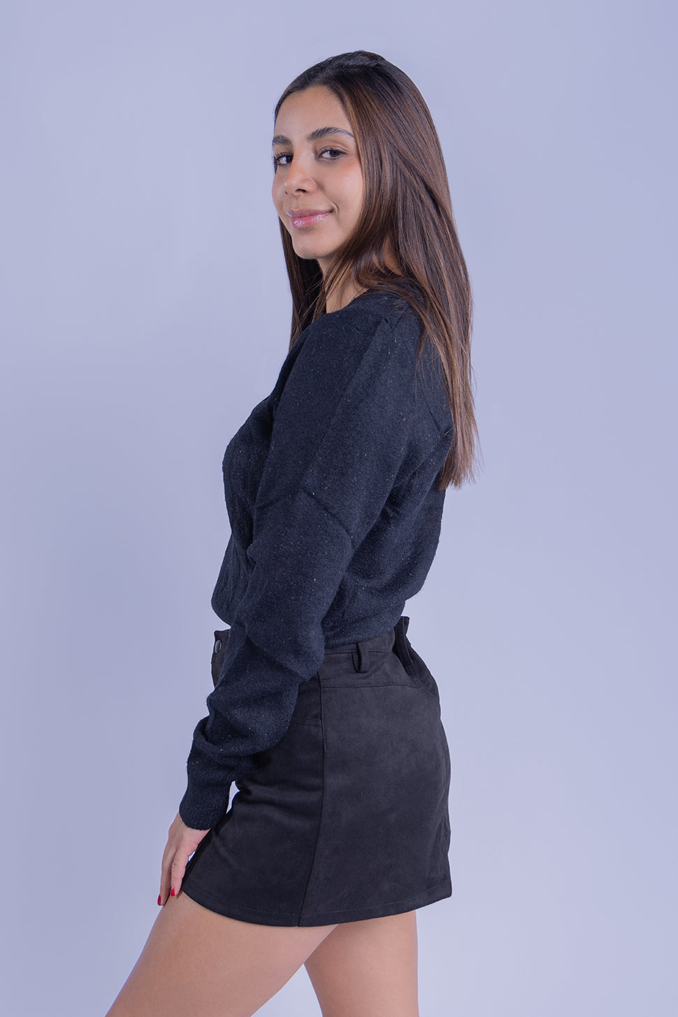 Suéter negro con bordado de osito