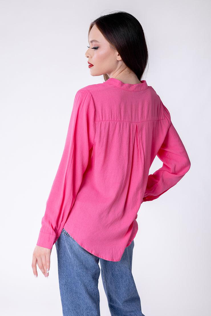 Blusa sencilla cuello V de mangas largas