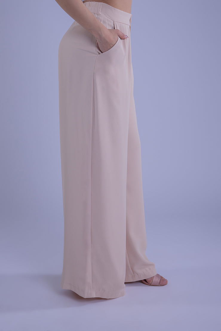 Pantalón beige con pinzas