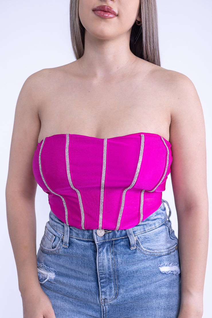 Top fiusha con aplicaciones de brillos