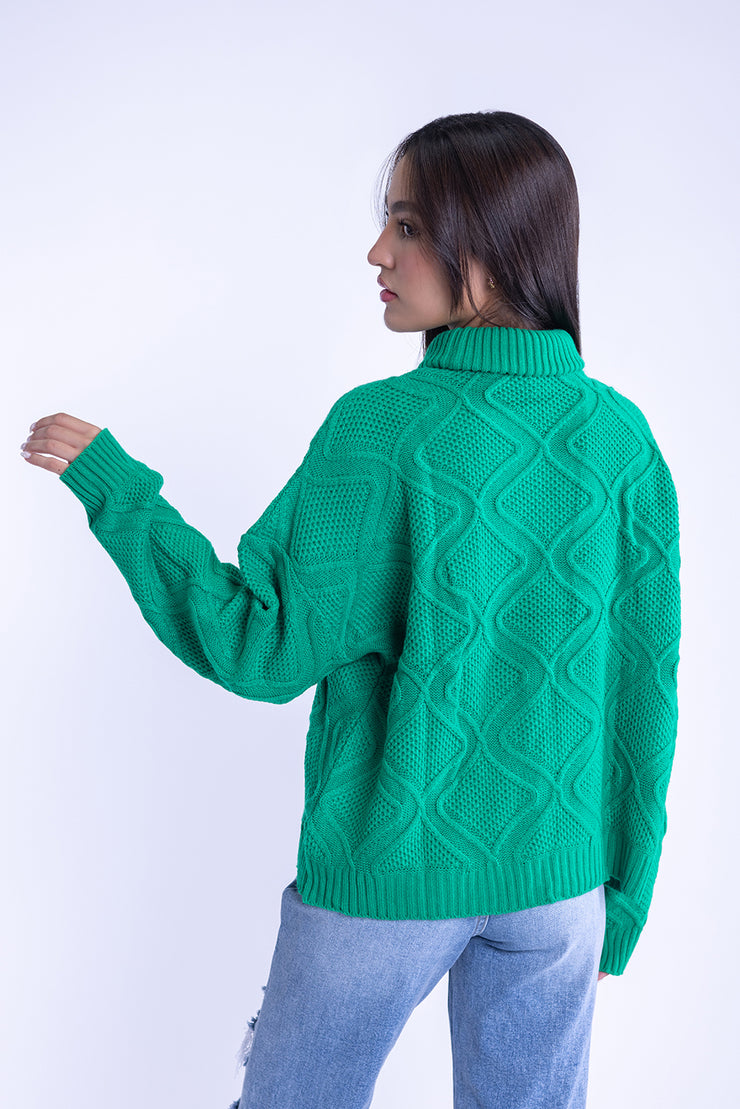 Suéter verde con diseño tejido de rombos