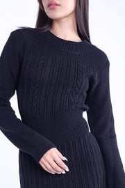 Vestido negro con figuras tipo tejido