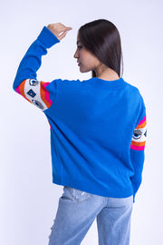 Suéter azul  con franja de figras