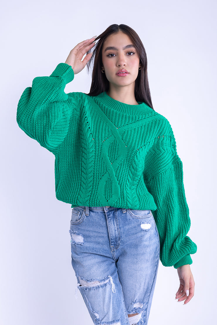 Suéter verde con mangas amplias