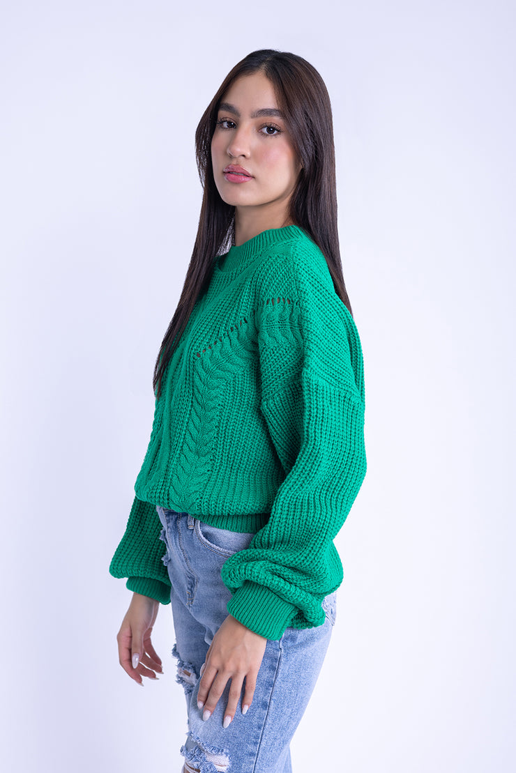 Suéter verde con mangas amplias