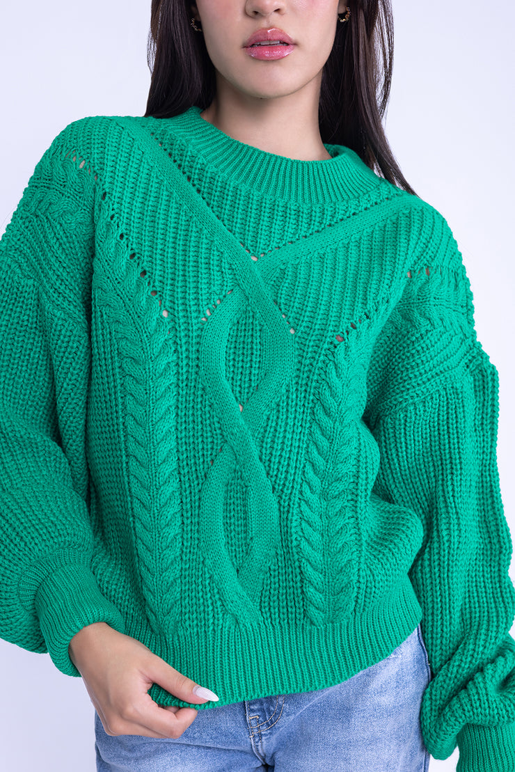 Suéter verde con mangas amplias