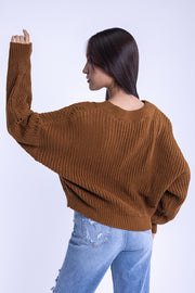Suéter con efecto desgarrado