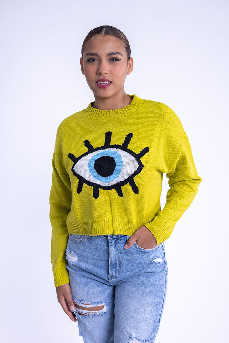 Suéter verde con diseño de ojo