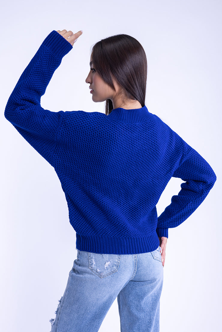 Suéter cuello redondo con detalles