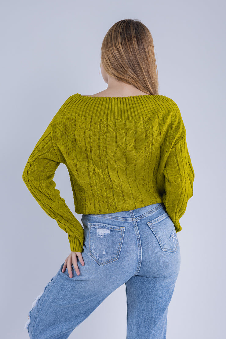Suéter con tejido en forma de trenza cuello caido