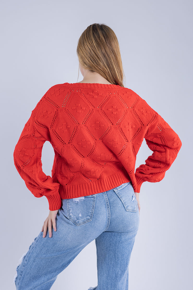 Suéter con diseño tejido de rombos