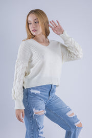 Suéter tejido con diseño de pétalos en manga