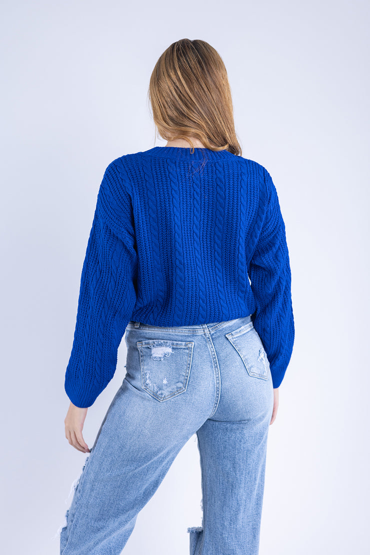 Suéter con diseño de rombos en tejido