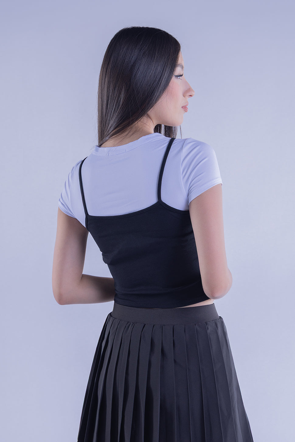 Blusa doble blanca y negra con detalle de brillos