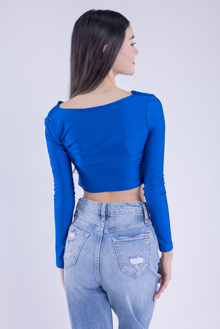 Crop top con manga larga con cuello holgado