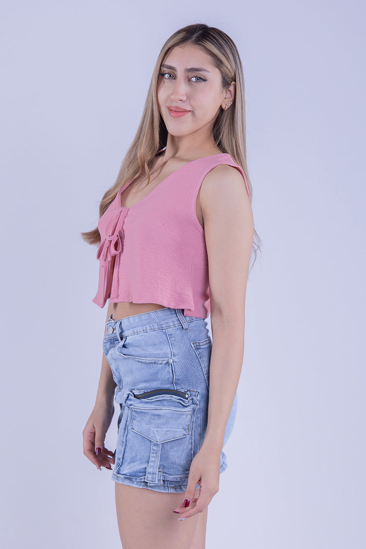 Crop top rosa con moño