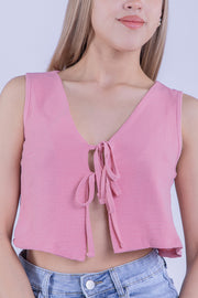 Crop top rosa con moño