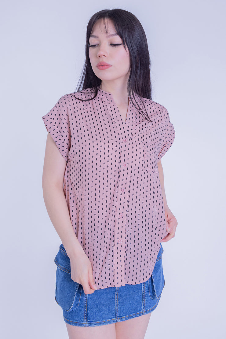 Blusa rosa de lunares
