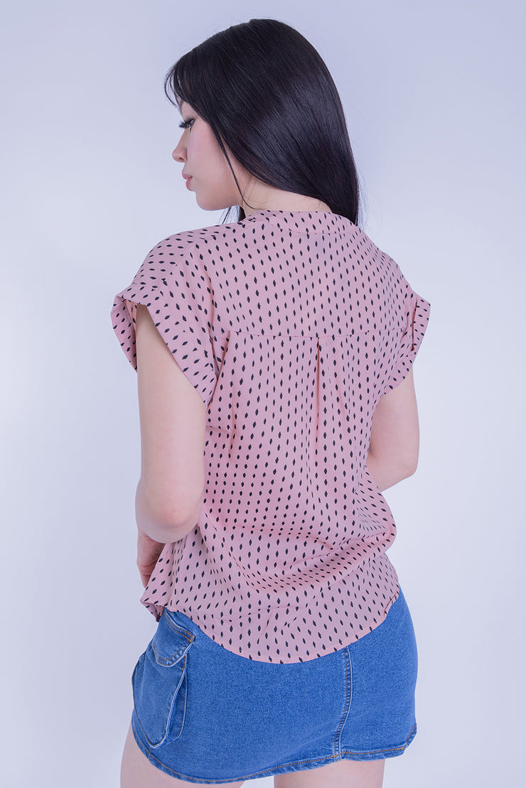 Blusa rosa de lunares