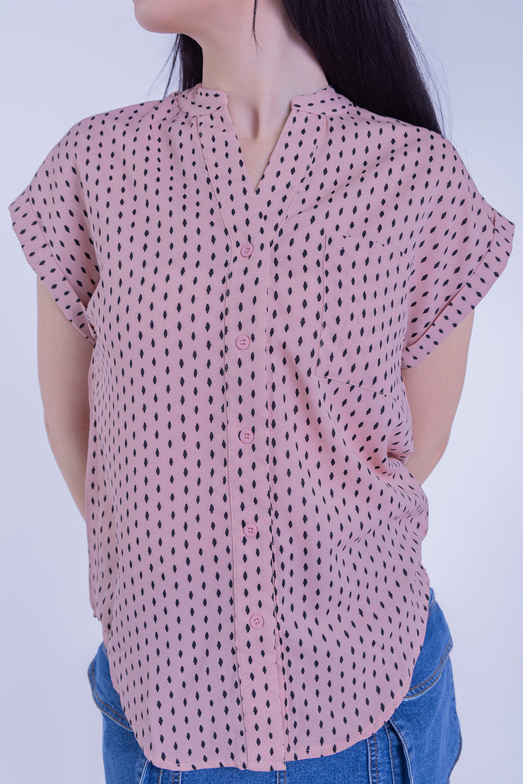 Blusa rosa de lunares
