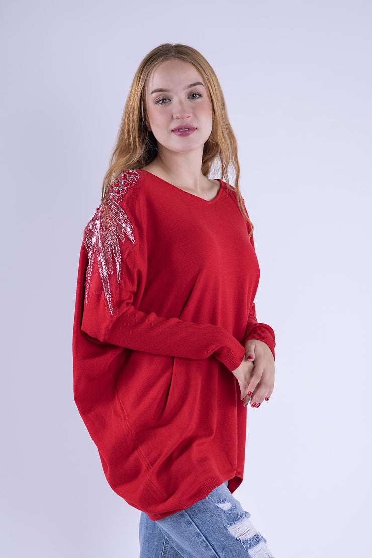 Suéter rojo oversize con cristales