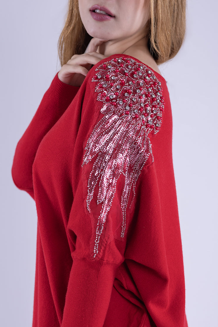 Suéter rojo oversize con cristales