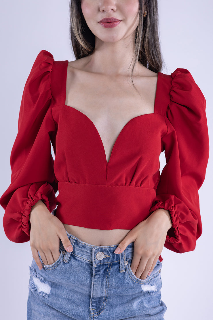Top rojo con manga tipo globo