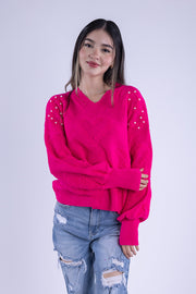 Suéter con perlas en hombro