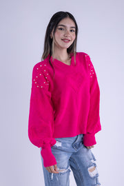 Suéter con perlas en hombro